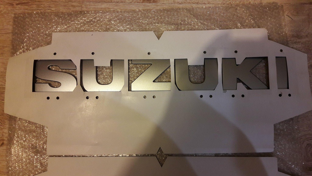 Napis Suzuki Grand Vitara Orginał na koło zapasowe