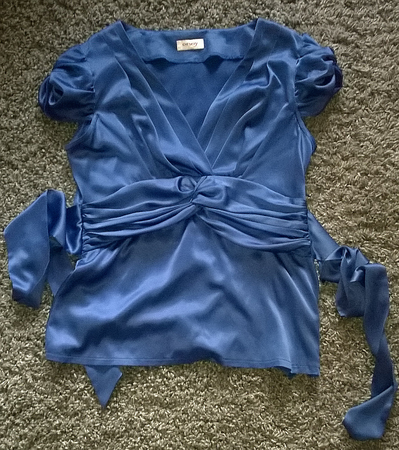 Śliczna bluzka Orsay M niebieska kokarda bufki