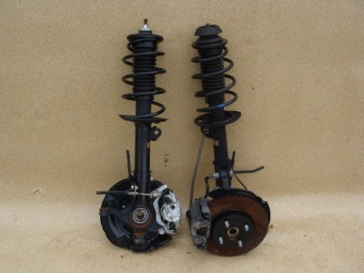 Амортизатор поворотный кулак правая toyota yaris ii фото №1