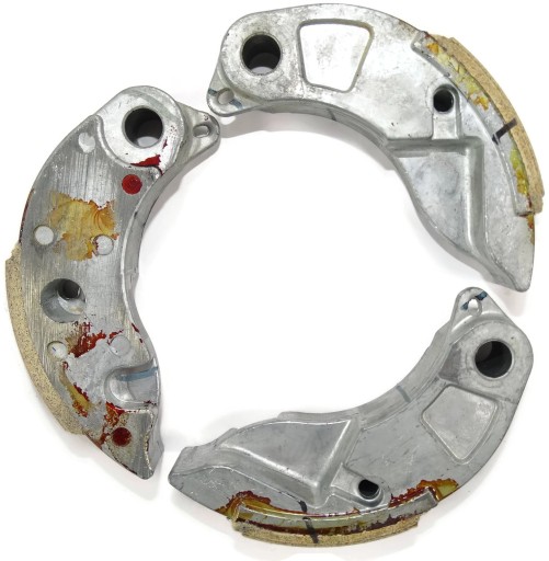 22535-KWN-900 - HONDA PCX125 150 OEM ЗЧЕПЛЕННЯ НАКЛАДКИ