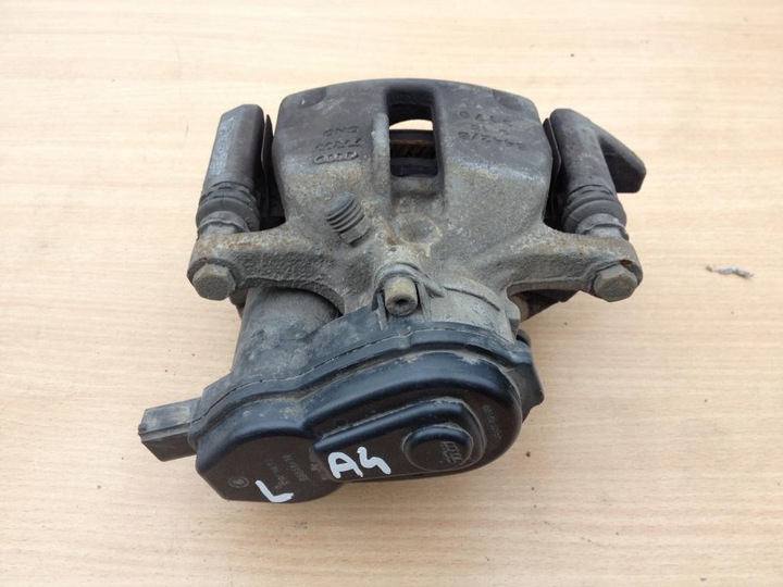 фото №1, Audi a5 8t суппорт тормозной левый зад электрический