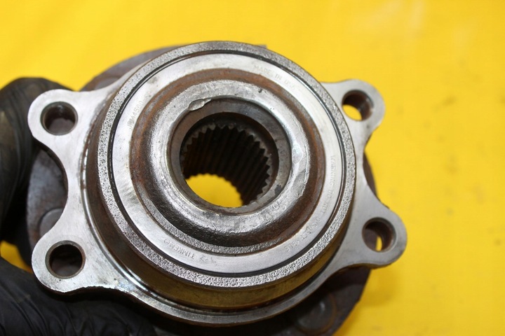 фото №6, Поворотный кулак колёса левый перед navara d40 2.5 dci